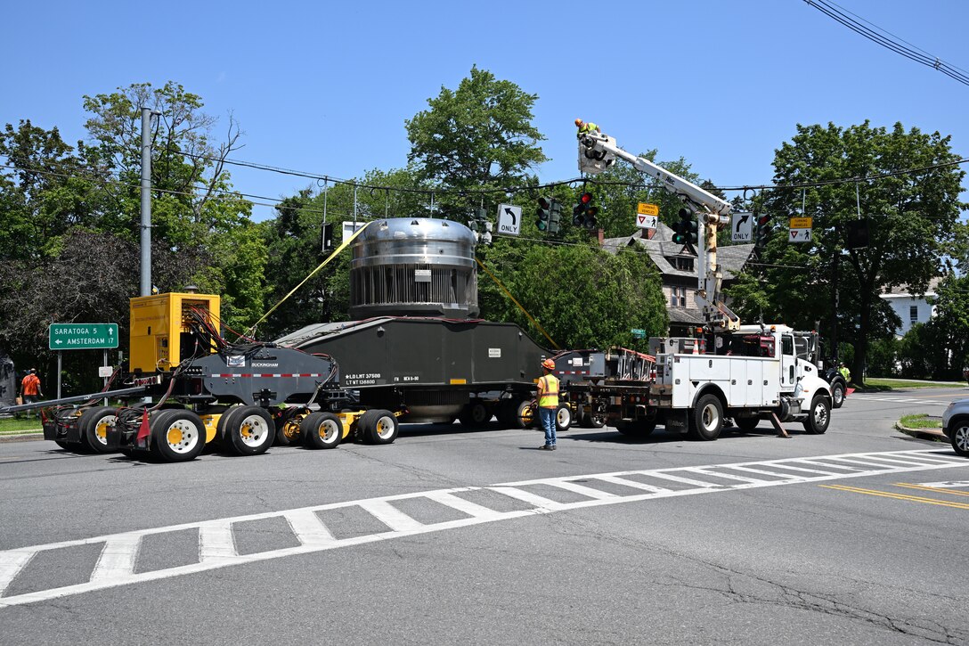As part of the MARF Defueling Layup Availability (DLA) Project at the Kenneth A. Kesselring Site (KSO), West Milton, New York, Norfolk Naval Shipyard workers, Lucia Specialized Hauling of VA, Inc., New York State Police and other agencies partnered to transport a loaded spent fuel shipping container which will be sent to Idaho National Laboratory, Idaho Falls, Idaho for extensive testing.