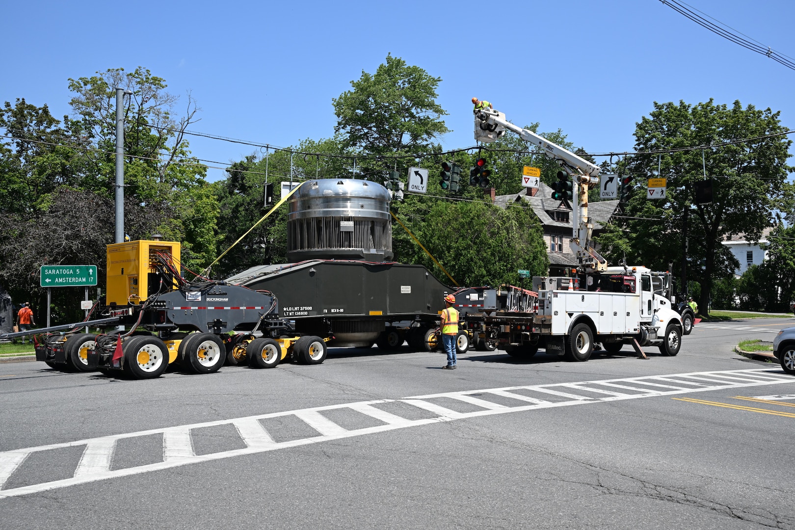 As part of the MARF Defueling Layup Availability (DLA) Project at the Kenneth A. Kesselring Site (KSO), West Milton, New York, Norfolk Naval Shipyard workers, Lucia Specialized Hauling of VA, Inc., New York State Police and other agencies partnered to transport a loaded spent fuel shipping container which will be sent to Idaho National Laboratory, Idaho Falls, Idaho for extensive testing.