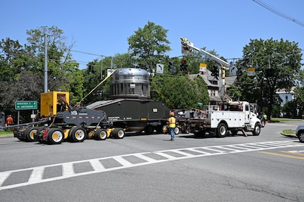As part of the MARF Defueling Layup Availability (DLA) Project at the Kenneth A. Kesselring Site (KSO), West Milton, New York, Norfolk Naval Shipyard workers, Lucia Specialized Hauling of VA, Inc., New York State Police and other agencies partnered to transport a loaded spent fuel shipping container which will be sent to Idaho National Laboratory, Idaho Falls, Idaho for extensive testing.