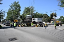 As part of the MARF Defueling Layup Availability (DLA) Project at the Kenneth A. Kesselring Site (KSO), West Milton, New York, Norfolk Naval Shipyard workers, Lucia Specialized Hauling of VA, Inc., New York State Police and other agencies partnered to transport a loaded spent fuel shipping container which will be sent to Idaho National Laboratory, Idaho Falls, Idaho for extensive testing.