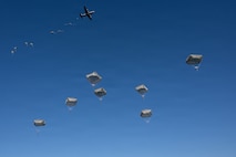 U.S. Army paratroopers assigned to the 11th Airborne Division descend during a practice jump for the New Year’s Jump Exercise at Camp Narashino Base, Japan, Jan. 9, 2026.