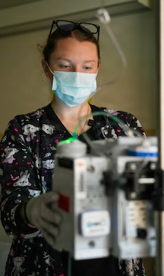 BAMC personnel assist patient during holiday event