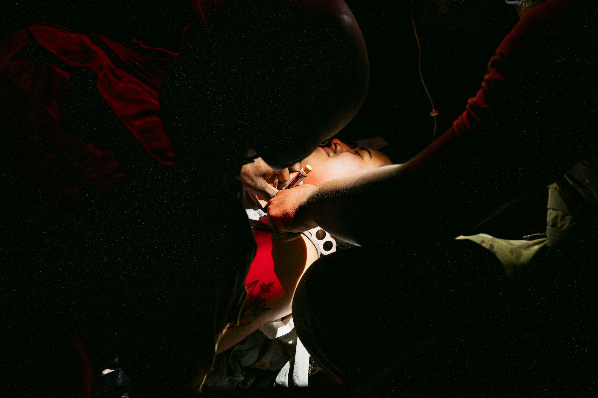 U.S. Airmen, assigned to the 99th Medical Group, perform needle decompression on a patient during the 2025 Diamondback Medic Rodeo at Nellis Air Force Base, Nevada, Dec. 9, 2025