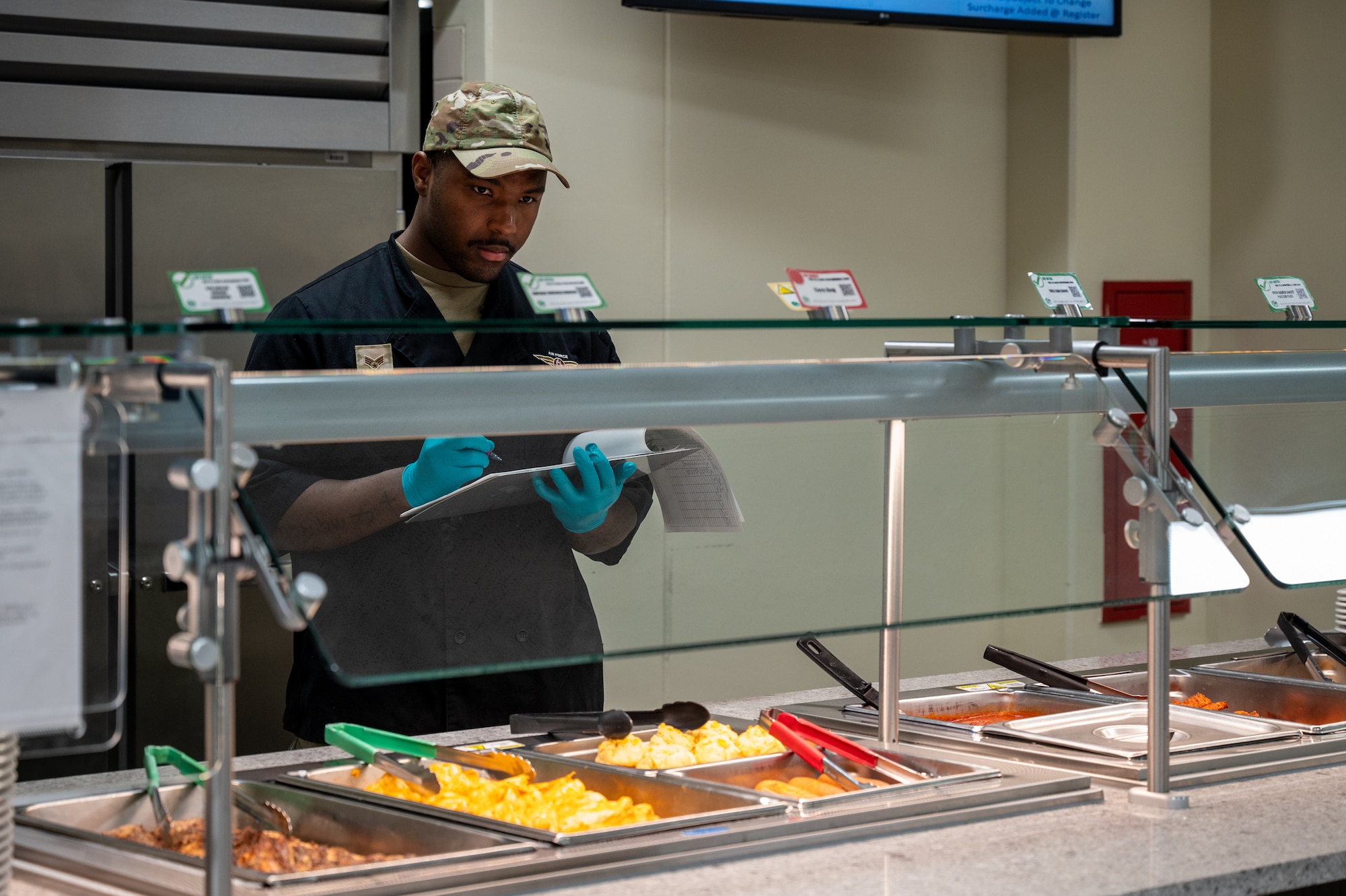 U.S. Air Force Airman 1st Class Jocelyne Pesantes, 718th Force Support Squadron food service member, prepares pasta sauce for a Marshall Dining Facility specialty bar at Kadena Air Base, Japan, Jan 8, 2026. Efficient preparation enables uninterrupted meal service, keeping Airmen fueled for around-the-clock operations. (U.S. Air Force photo by Airman 1st Class Francisco Huerta)