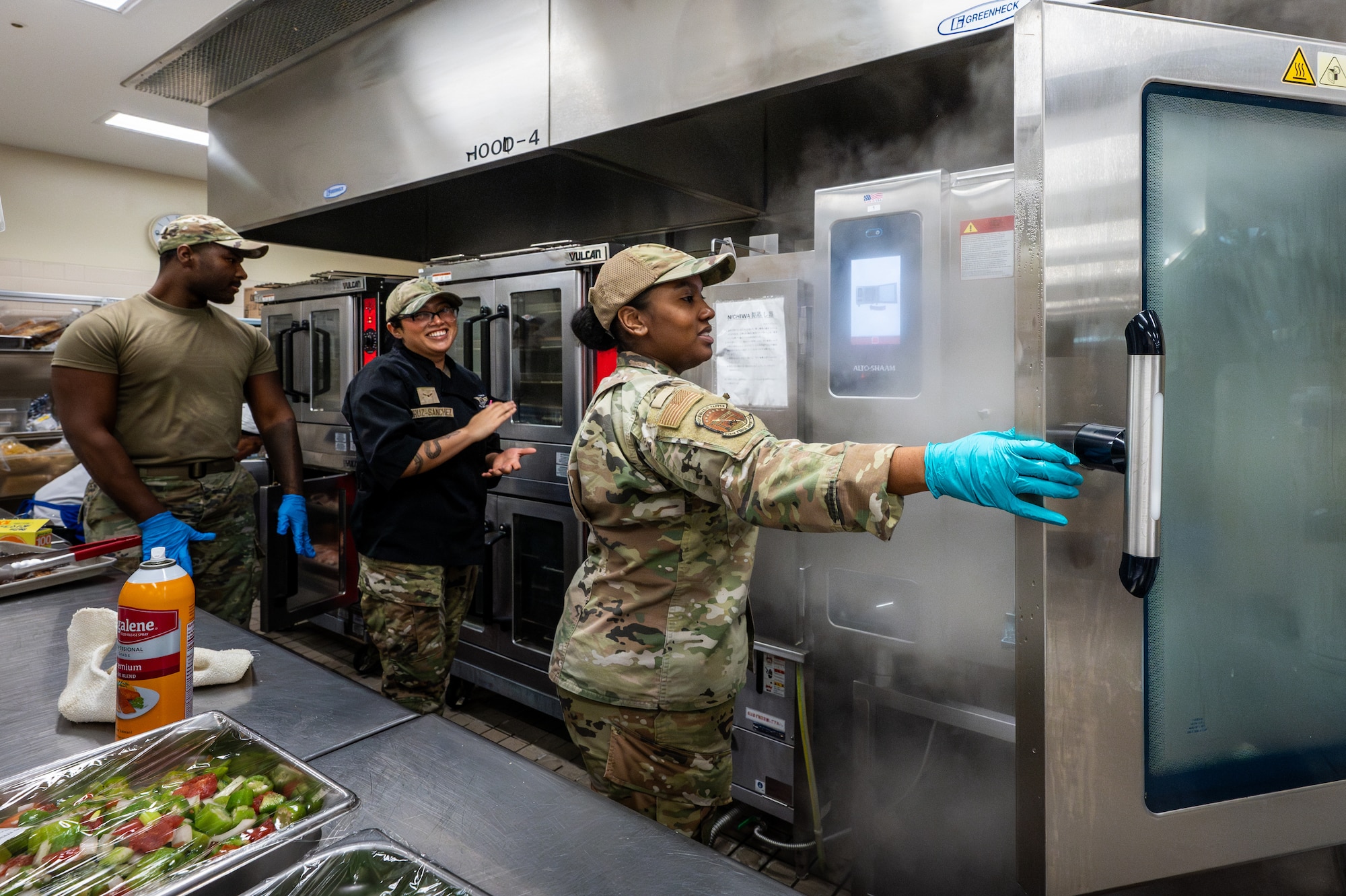 U.S. Air Force food service members from the 718th Force Support Squadron prepare meals at the Marshall Dining Facility at Kadena Air Base, Japan, Jan 8, 2026. The team supports the Air Force’s largest combat wing by serving hundreds of meals daily across multiple meal periods. (U.S. Air Force photo by Airman 1st Class Francisco Huerta)