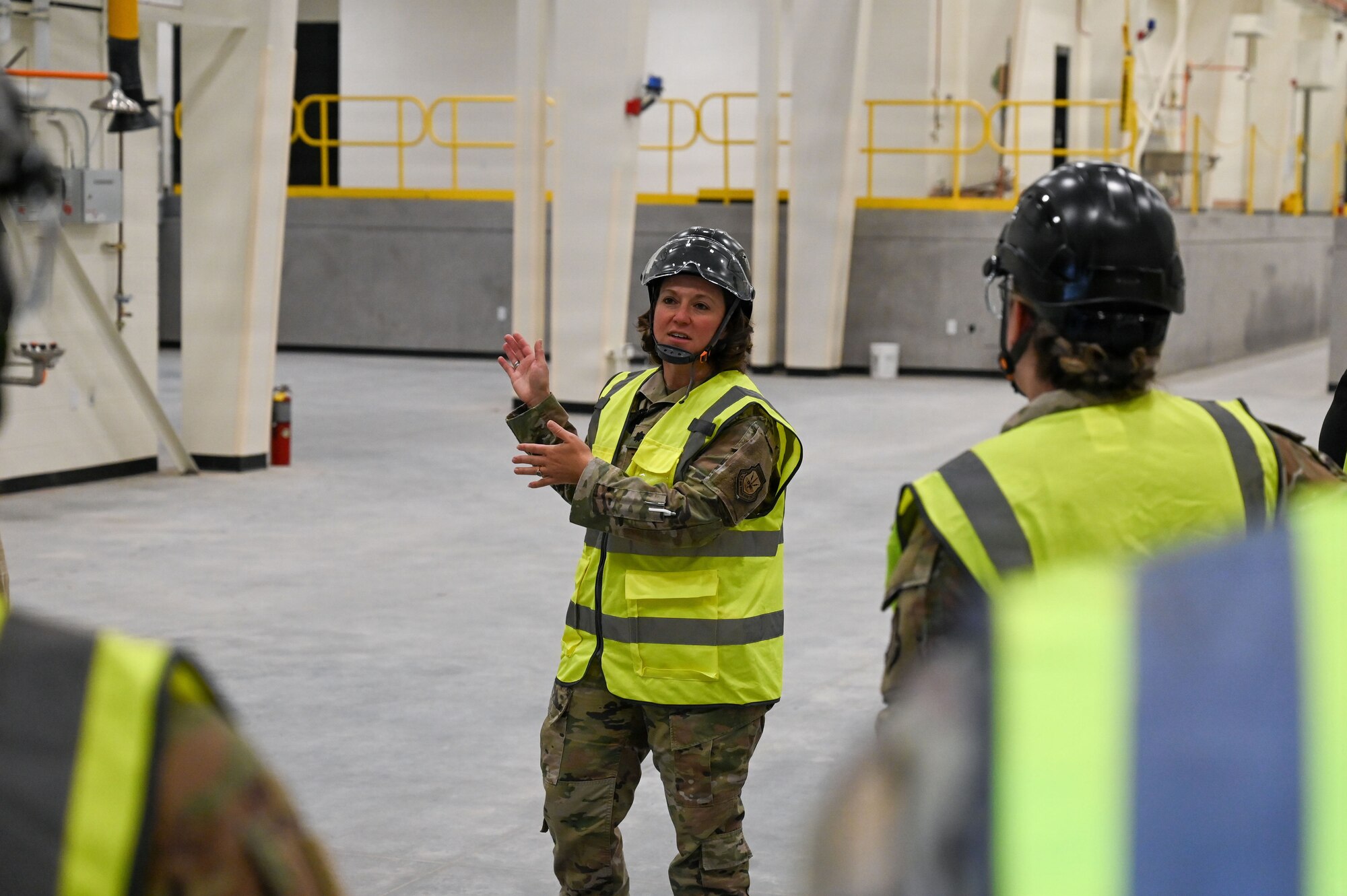 People stand outside.