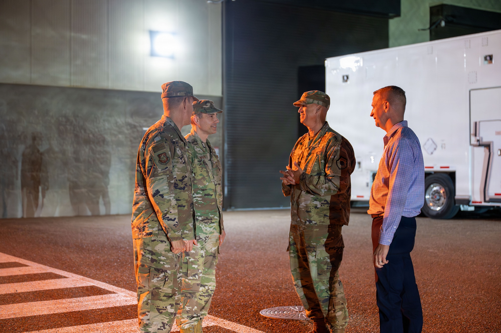 People stand outside.