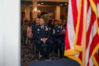 U.S. Air Force Col. James M. Clark, left, commander of Joint Base Anacostia Bolling and the 11th Wing, and Chief Master Sgt. Anthony Thompson Jr., right, senior enlisted leader for JBAB and 11th Wing command chief, observe opening remarks during the Community College of the Air Force graduation at JBAB, Washington, D.C., Jan. 9, 2026. One hundred twelve Airmen and

Guardians graduated during the ceremony from JBAB, Joint Base Andrews, Md., and the Pentagon. (U.S. Air Force photo by Airman 1st Class Shanel Toussaint)