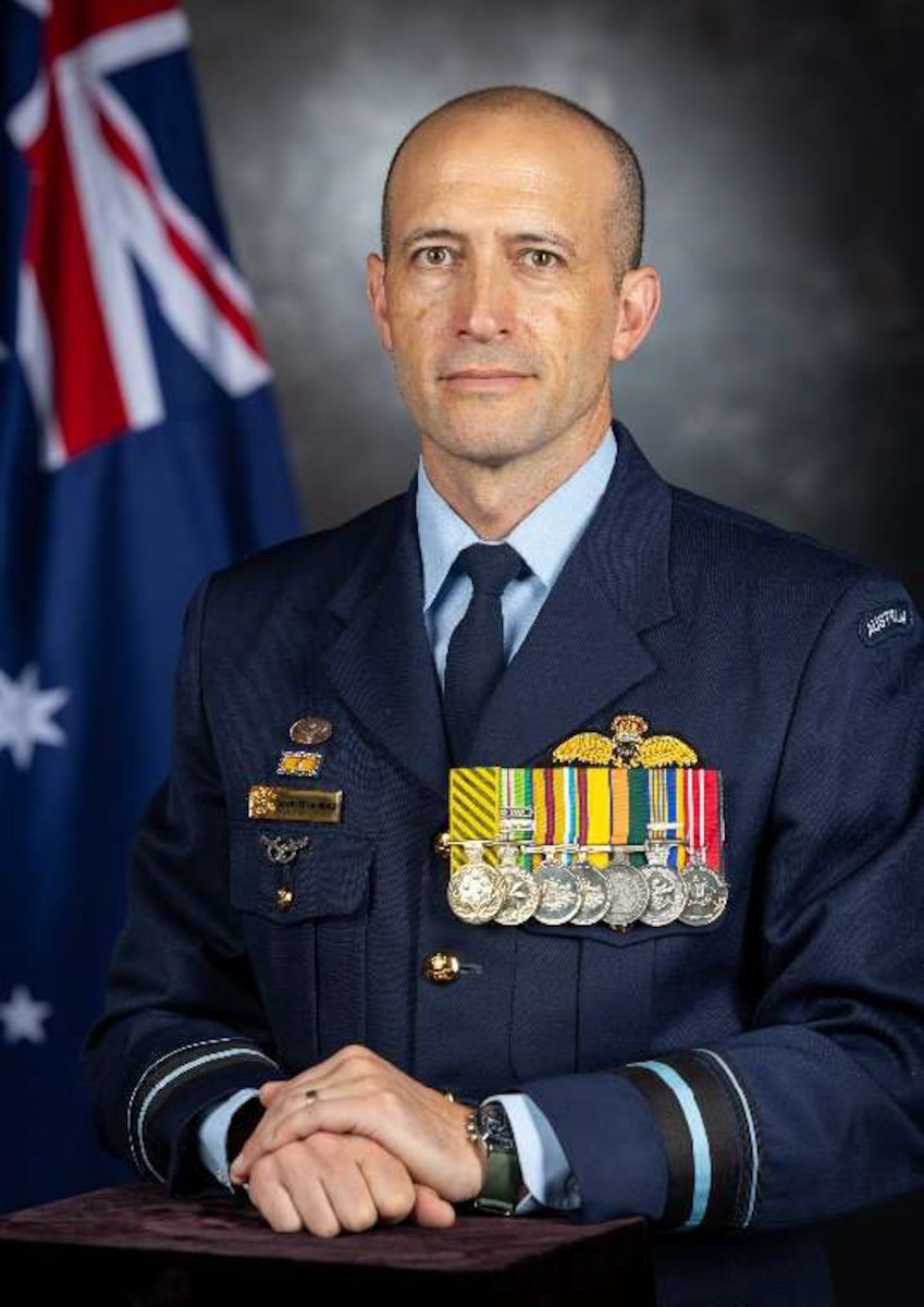 A portrait of a male senior military officer in a military suit.