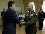 Maj. Gen. Rodney Boyd of the Illinois National Guard and Portuguese Lt. Gen. Rui Freitas shake hands after signing a State Partnership Program agreement in Lisbon on Jan. 12.