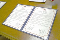 Maj. Gen. Rodney Boyd of the Illinois National Guard and Portuguese Lt. Gen. Rui Freitas sign a formal agreement on Jan. 12, creating a State Partnership Program between their respective forces.