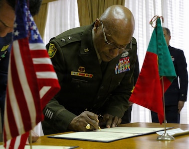 Maj. Gen. Rodney Boyd, The Adjutant General of Illinois, signs the formal agreement creating a State Partnership Program between the Illinois National Guard and the Portuguese military in Lisbon on Jan. 12.