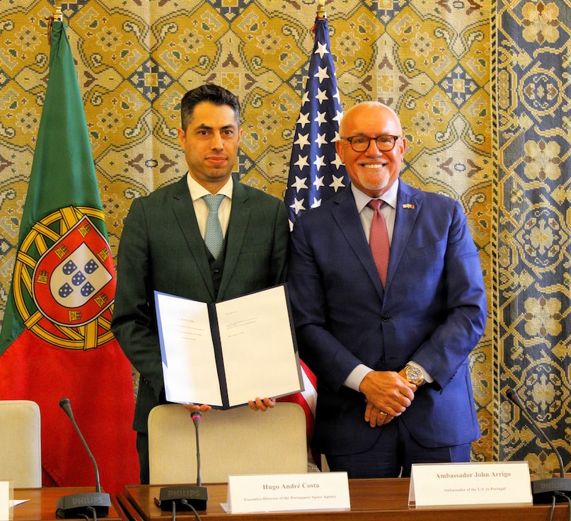 Hugo Costa, executive director for the Portuguese Space Agency, and U.S. Ambassador to Portugal John J. Arrigo pose for a photo.