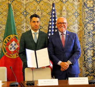 Hugo Costa, executive director for the Portuguese Space Agency, and U.S. Ambassador to Portugal John J. Arrigo pose for a photo.