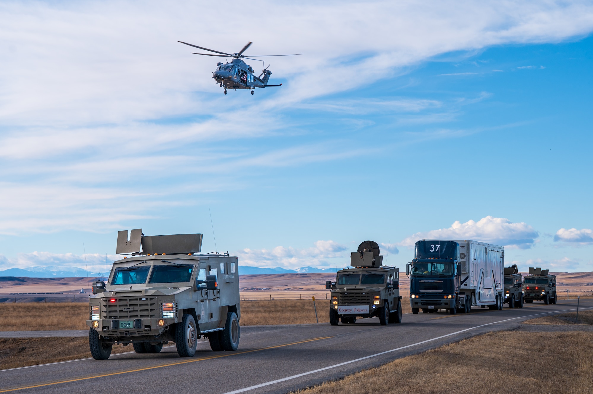 A U.S. Air Force MH-139 Grey Wolf assigned to the 40th Helicopter Squadron conducts its first operational mission alongside 341st Missile Security Operations Squadron convoys at Malmstrom Air Force Base, Montana, Jan. 8, 2026. The transition to the Grey Wolf strengthens nuclear deterrence operations by providing an agile and survivable transport platform for tactical response forces to protect critical assets. (U.S. Air Force photo by Airman 1st Class Jack Rodriguez Escamilla)