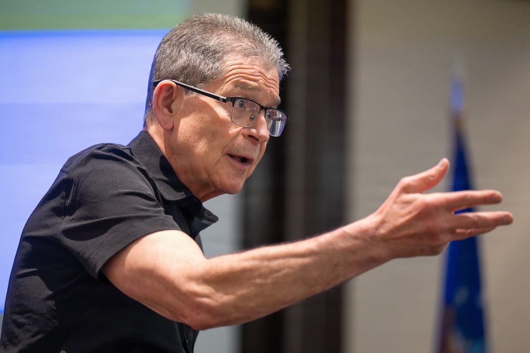 Man gives speech to audience