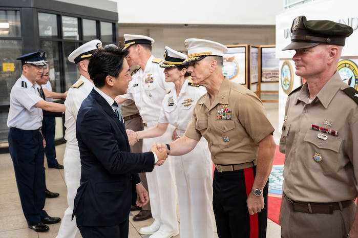 Japanese Minister of Defense Shinjirō Koizumi greets U.S. Marine Corps Maj. Gen. George Rowell, U.S. Indo-Pacific Command director of strategic planning and policy, J5, at USINDOPACOM headquarters, Camp H.M. Smith, Hawaii, Jan. 12, 2026.
