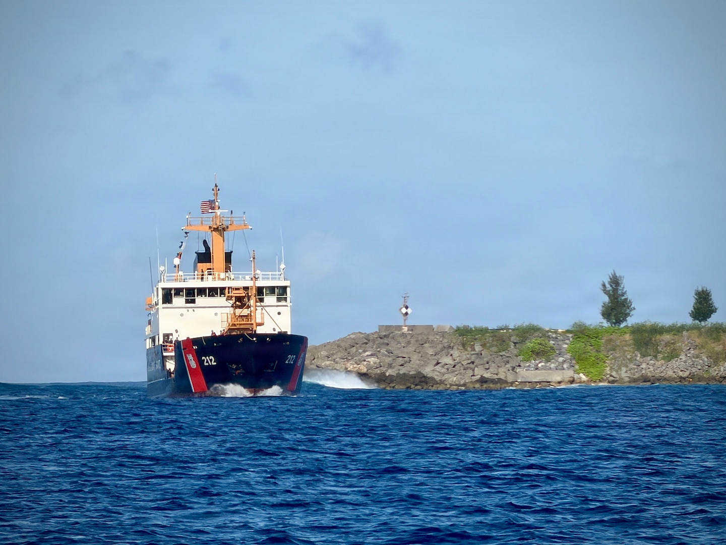 The USCGC Hickory (WLB 212), a 225-foot Juniper-class seagoing buoy tender, arrives in Apra Harbor as it comes to their new homeport in Guam on Jan. 14, 2026, following a more than 13,000-mile transit over 71 days from the U.S. Coast Guard Yard in Baltimore through the Panama Canal. After an extended Major Maintenance Availability at the Yard, part of the In-Service Vessel Sustainment Program that modernizes the entire Juniper-class fleet with hull repairs, system upgrades, and replacement of obsolete equipment, the Hickory is now fully revitalized. (U.S. Coast Guard photo by Chief Warrant Officer Muir)