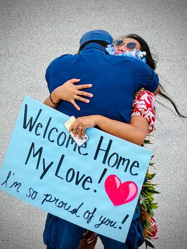 Families greet loved ones as the USCGC Hickory (WLB 212), a 225-foot Juniper-class seagoing buoy tender, arrives at its new homeport in Guam on Jan. 14, 2026, following a more than 13,000-mile transit over 71 days from the U.S. Coast Guard Yard in Baltimore through the Panama Canal. After an extended Major Maintenance Availability at the Yard, part of the In-Service Vessel Sustainment Program that modernizes the entire Juniper-class fleet with hull repairs, system upgrades, and replacement of obsolete equipment, the Hickory is now fully revitalized. (U.S. Coast Guard photo by Chief Warrant Officer Muir)