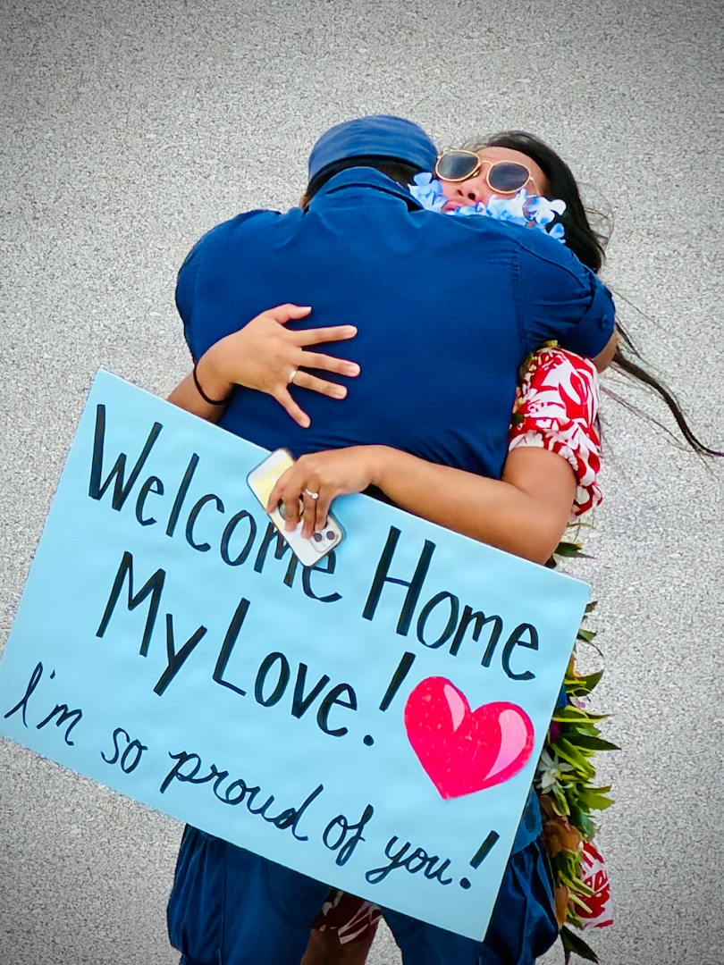 Families greet loved ones as the USCGC Hickory (WLB 212), a 225-foot Juniper-class seagoing buoy tender, arrives at its new homeport in Guam on Jan. 14, 2026, following a more than 13,000-mile transit over 71 days from the U.S. Coast Guard Yard in Baltimore through the Panama Canal. After an extended Major Maintenance Availability at the Yard, part of the In-Service Vessel Sustainment Program that modernizes the entire Juniper-class fleet with hull repairs, system upgrades, and replacement of obsolete equipment, the Hickory is now fully revitalized. (U.S. Coast Guard photo by Chief Warrant Officer Muir)