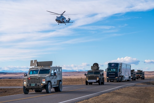 A U.S. Air Force MH-139 Grey Wolf assigned to the 40th Helicopter Squadron conducts its first operational mission alongside 341st Missile Security Operations Squadron convoys at Malmstrom Air Force Base, Montana, Jan. 8, 2026. The transition to the Grey Wolf strengthens nuclear deterrence operations by providing an agile and survivable transport platform for tactical response forces to protect critical assets. (U.S. Air Force photo by Airman 1st Class Jack Rodriguez Escamilla)