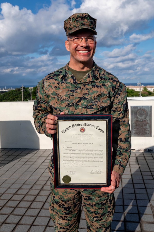 U.S. Marine Corps 1st Sgt. Christopher McCullar poses for a photo during his redesignation ceremony on Camp Foster, Okinawa, Japan, Jan. 9, 2026.