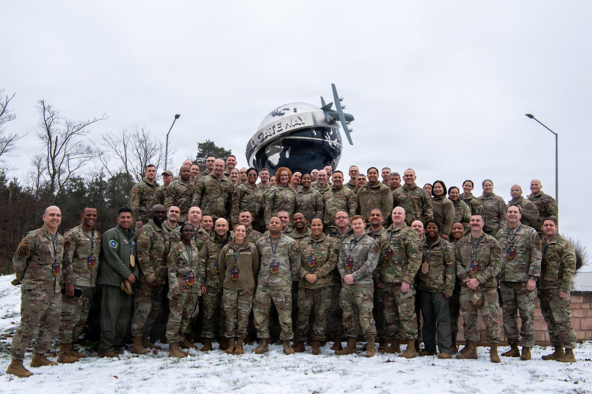 U.S. Air Force Team Ramstein leadership and chief master sergeant-selects pose for a group photo after notifying members of their promotion selections at Ramstein Air Base, Germany, January 8, 2026.