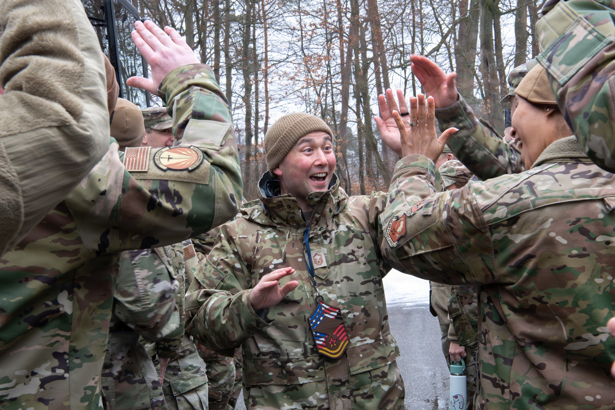 U.S. Air Force Senior Master Sgt. Jacob Sickich, Air Allied Command operations superintendent receives high-fives from other chief selects after being notified of his selection for promotion to E-9 at Ramstein Air Base, Germany, Jan. 8, 2026.