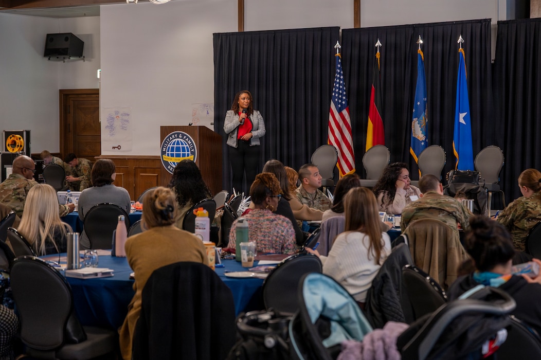 Nikki Earl, Military and Family Readiness Center relocation assistance program manager, briefs 2026 Keys Symposium attendees on the M&FRC’s sponsorship program at Ramstein Air Base, Germany, Jan. 13, 2026.