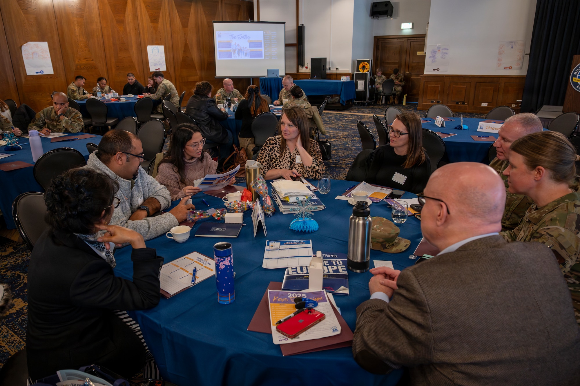 Attendees of the 2026 Keys Symposium review a problem-solving scenario at Ramstein Air Base, Germany, Jan. 13, 2026.