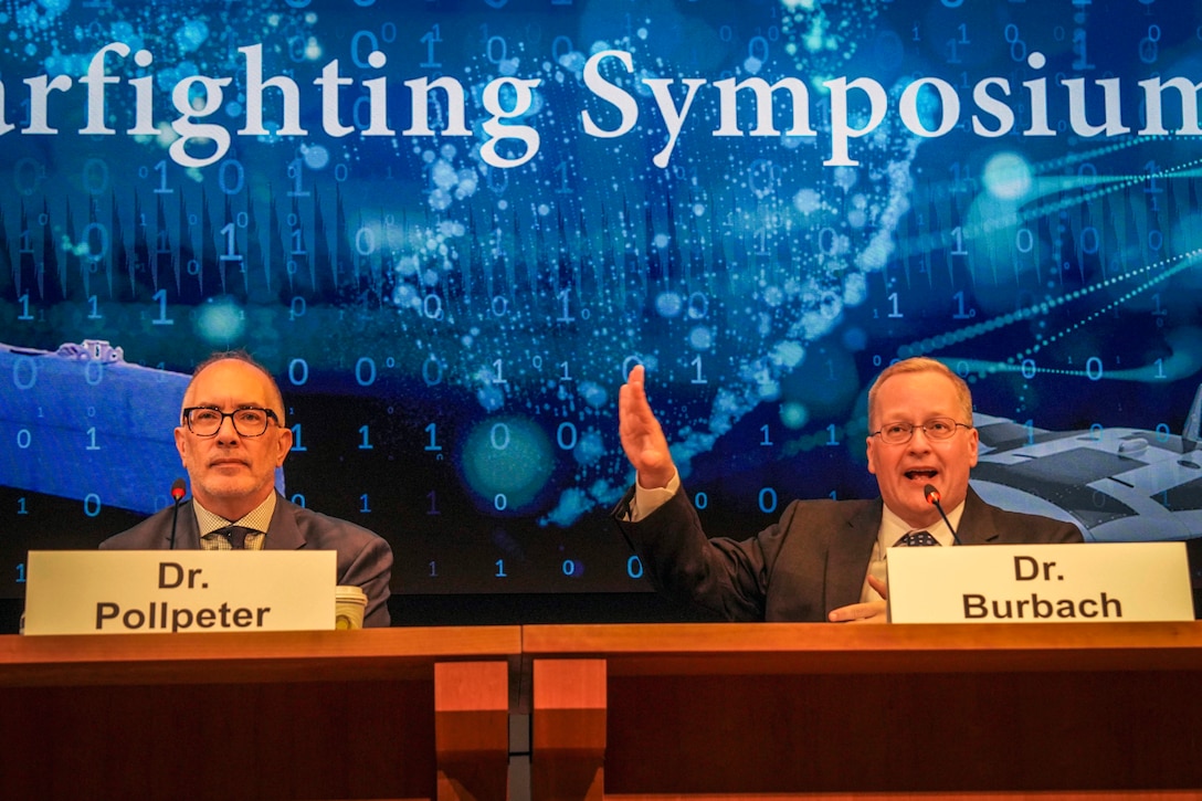 Dr. Kevin Pollpeter, Director of Research for the China Aerospace Studies Institute, and Professor David T. Burbach, Ph.D., Director of the Naval War College Space Studies Group, answer questions during Naval War College’s Future Warfighting Symposium onboard Naval Station Newport, Rhode Island, August 7, 2025 (U.S. Navy/Connor Burns)