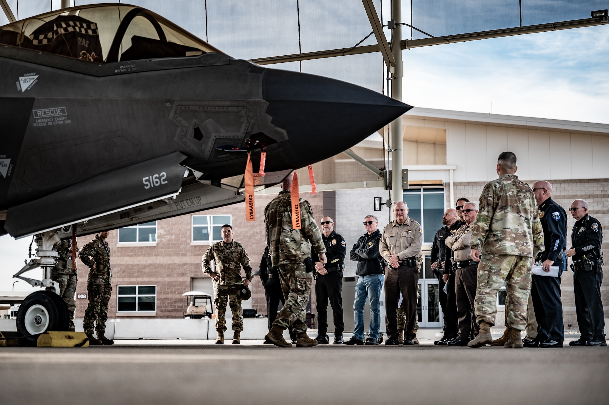 A delegation of local Police Chiefs tours the flightline at the 62nd Aircraft Maintenance Unit