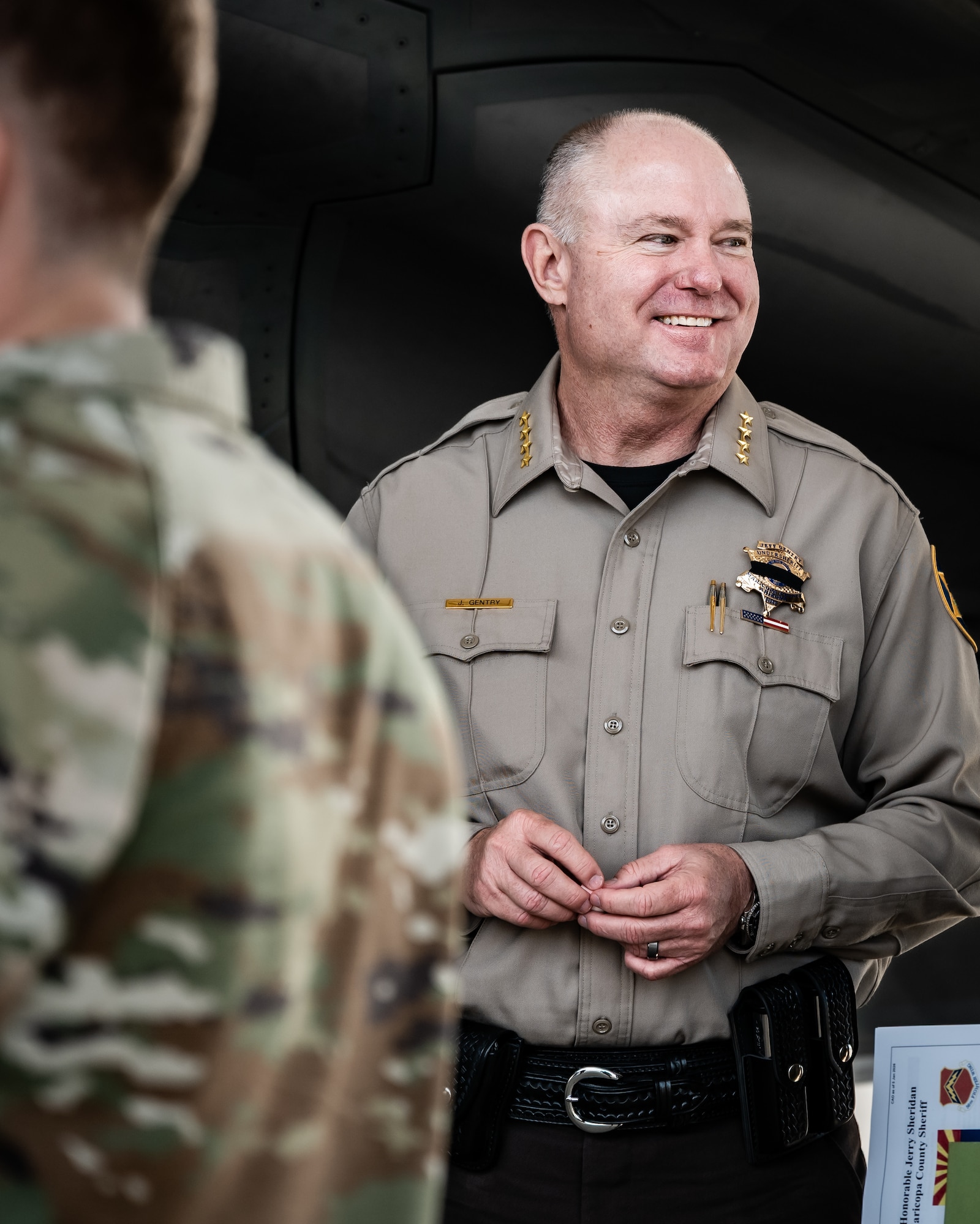 Jeff Gentry, Maricopa County Sheriff's Office undersheriff , smiles during a tour of the flightline at the 62nd Aircraft Maintenance Unit