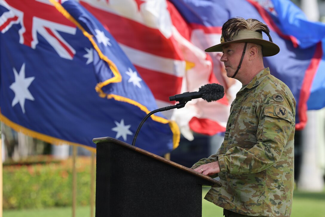 Australian Army Lt. Gen. Scott A. Winter, outgoing deputy commanding general for strategy and plans, U.S. Army Pacific, delivers remarks during a Flying V ceremony at historic Palm Circle, Fort Shafter, Hawaii, Jan. 6, 2026.