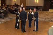 Brigade leadership from the 404th Maneuver Enhancement Brigade conduct a Change of Command ceremony, formally transferring authority from Col. David Helfrich to Col. Jessica McPherson in Normal, Illinois, Jan. 10, 2026.