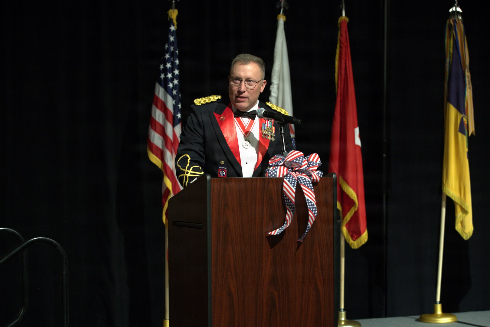 Col. David Helfrich gives his outgoing remarks during the 404th Maneuver Enhancement Brigade's Change of Command ceremony in Normal, Illinois, on Jan. 10, 2026.