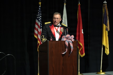Col. David Helfrich gives his outgoing remarks during the 404th Maneuver Enhancement Brigade's Change of Command ceremony in Normal, Illinois, on Jan. 10, 2026.