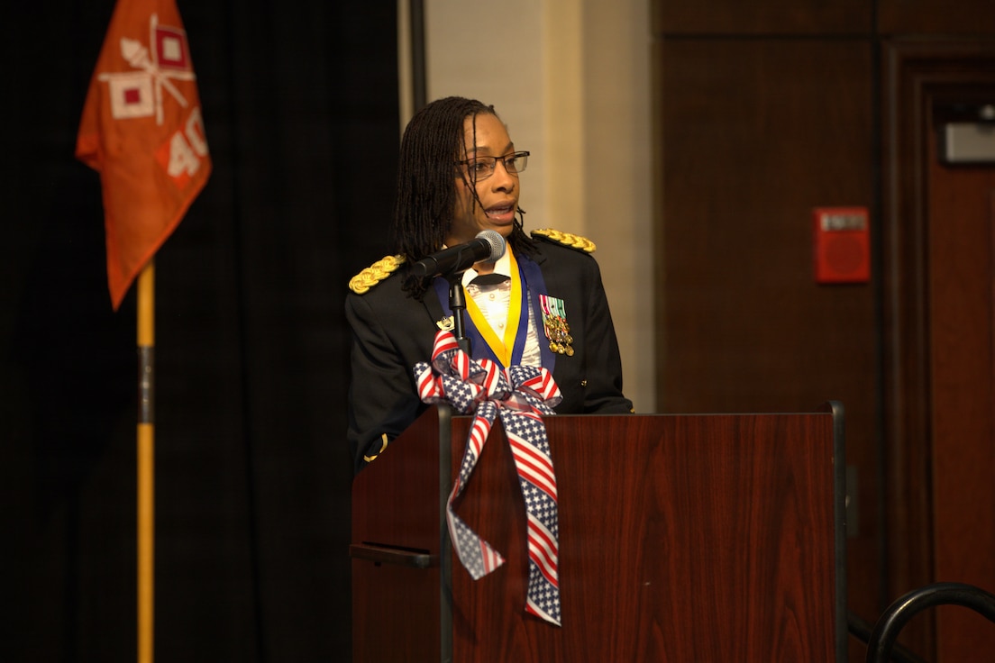 Col. Jessica McPherson addresses Soldiers and guests after assuming command of the Illinois Army National Guard’s 404th Maneuver Enhancement Brigade during a Change of Command ceremony in Normal, Illinois, Jan. 10, 2026.