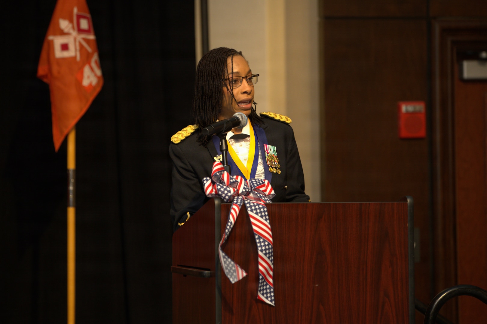 Col. Jessica McPherson addresses Soldiers and guests after assuming command of the Illinois Army National Guard’s 404th Maneuver Enhancement Brigade during a Change of Command ceremony in Normal, Illinois, Jan. 10, 2026.