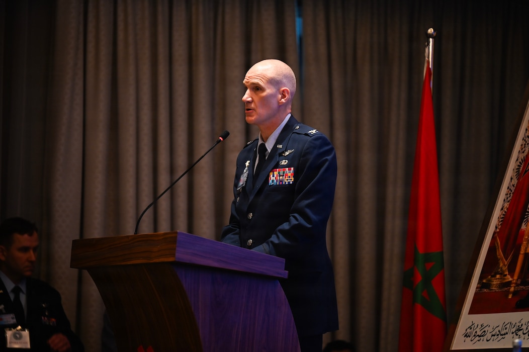 U.S. Air Force Col. Thomas Stamp, U.S. Air Forces in Europe - Air Forces Africa command surgeon, gives his opening remarks at the African Partner Outbreak Response Alliance 2025 Workshop in Rabat, Morocco, December 8, 2025. Representatives from 34 African nations came together with members from the U.S. Africa Command and USAFE-AFAFRICA command surgeon offices to engage in discussion on how to further enhance health security across the African continent. (U.S. Air Force photo by Capt. Benjamin Aronson) (This photo was altered for security purposes by blurring a security badge.)