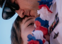 JOINT BASE PEARL HARBOR-HICKAM, Hawaii (Dec 8, 2025) –  Chief Machinist’s Mate Derek Hosley, assigned to Virginia-class fast-attack submarine USS Hawaii (SSN 776), meets his son pierside as Hawaii returns to its homeport at Joint Base Pearl Harbor-Hickam following a scheduled deployment, Dec. 8, 2025. Hawaii is assigned to Submarine Squadron 1 and is capable of supporting various missions, including anti-submarine warfare, anti-surface ship warfare, strike warfare, special operations forces support, and intelligence, surveillance, and reconnaissance. (U.S. Navy photo by Mass Communication Specialist 2nd Class Nicholas Russell)