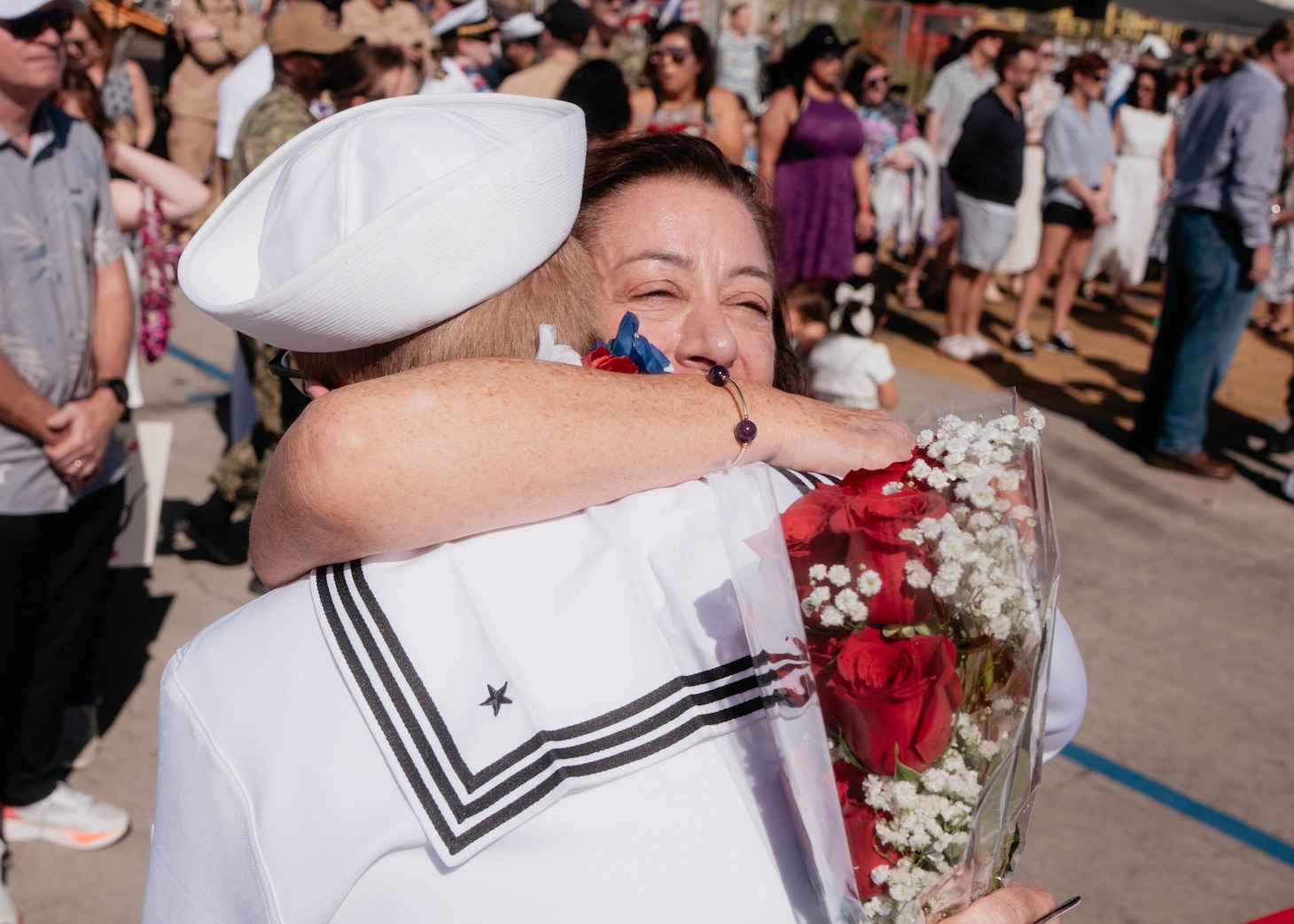 JOINT BASE PEARL HARBOR-HICKAM, Hawaii (Dec 8, 2025) - A Sailor assigned to Virginia-class fast-attack submarine USS Hawaii (SSN 776) meets his family pierside as Hawaii returns to its homeport at Joint Base Pearl Harbor-Hickam following a scheduled deployment, Dec. 8, 2025. Hawaii is assigned to Submarine Squadron 1 and is capable of supporting various missions, including anti-submarine warfare, anti-surface ship warfare, strike warfare, special operations forces support, and intelligence, surveillance, and reconnaissance. (U.S. Navy photo by Mass Communication Specialist 2nd Class Nicholas Russell)