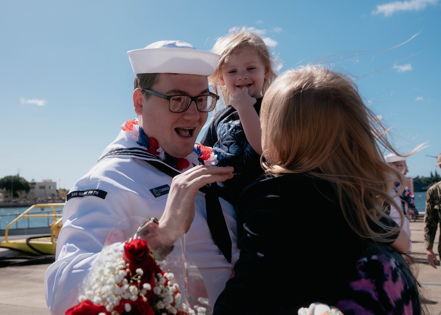 JOINT BASE PEARL HARBOR-HICKAM, Hawaii (Dec 8, 2025) - Machinist’s Mate (Nuclear) 2nd Class Robert Turner, assigned to Virginia-class fast-attack submarine USS Hawaii (SSN 776), meets his family pierside as Hawaii returns to its homeport at Joint Base Pearl Harbor-Hickam following a scheduled deployment, Dec. 8, 2025. Hawaii is assigned to Submarine Squadron 1 and is capable of supporting various missions, including anti-submarine warfare, anti-surface ship warfare, strike warfare, special operations forces support, and intelligence, surveillance, and reconnaissance.  (U.S. Navy photo by Mass Communication Specialist 2nd Class Nicholas Russell)