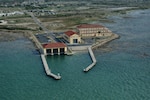 An architectural rendering depicts the future U.S. Coast Guard Station South Padre Island, Texas. The $200 million recapitalization project includes new operational, support, and waterfront facilities, and is scheduled for completion in 2028. (U.S. Coast Guard courtesy illustration)
