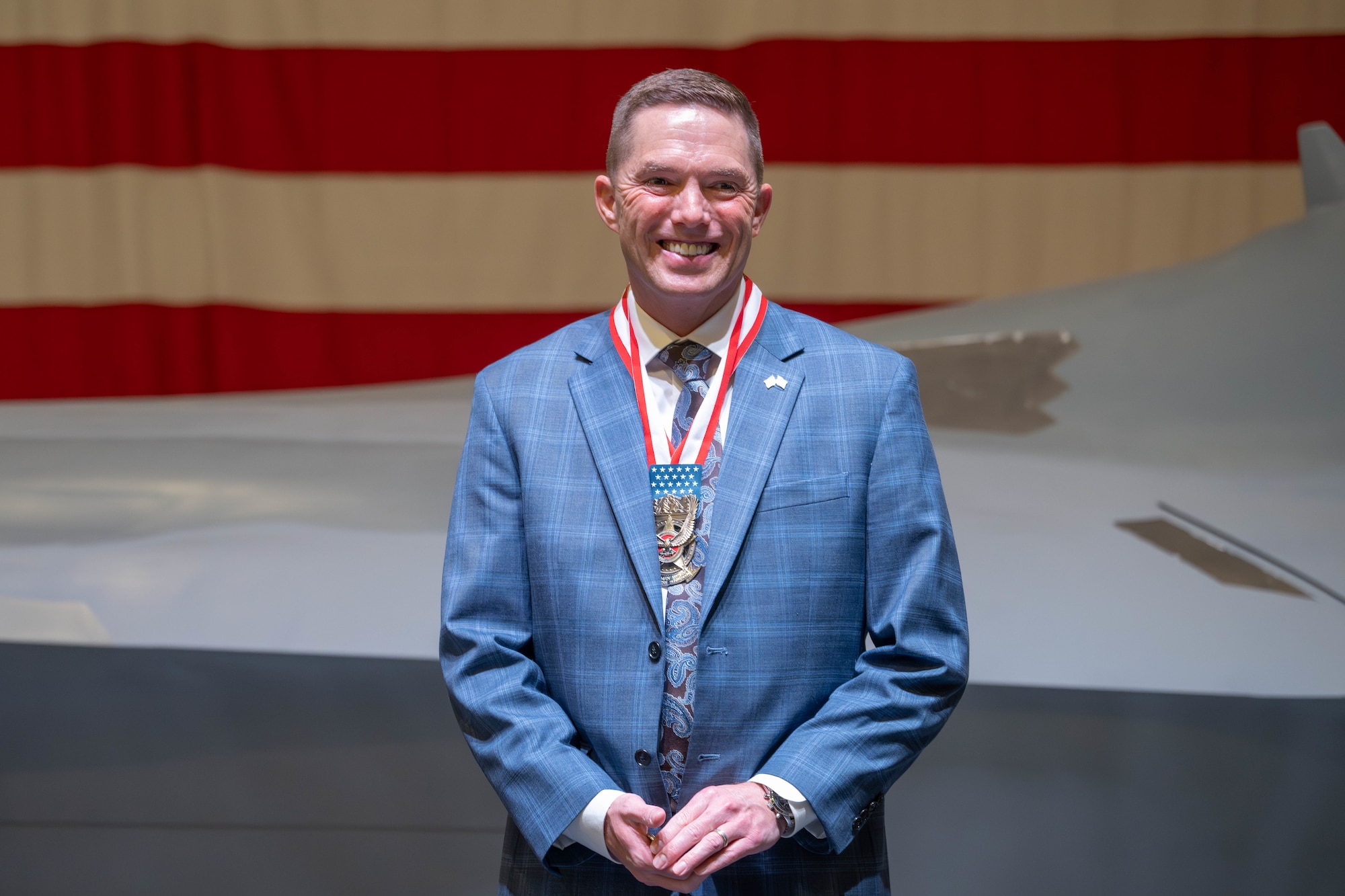 Steve Hiatt pauses on stage.