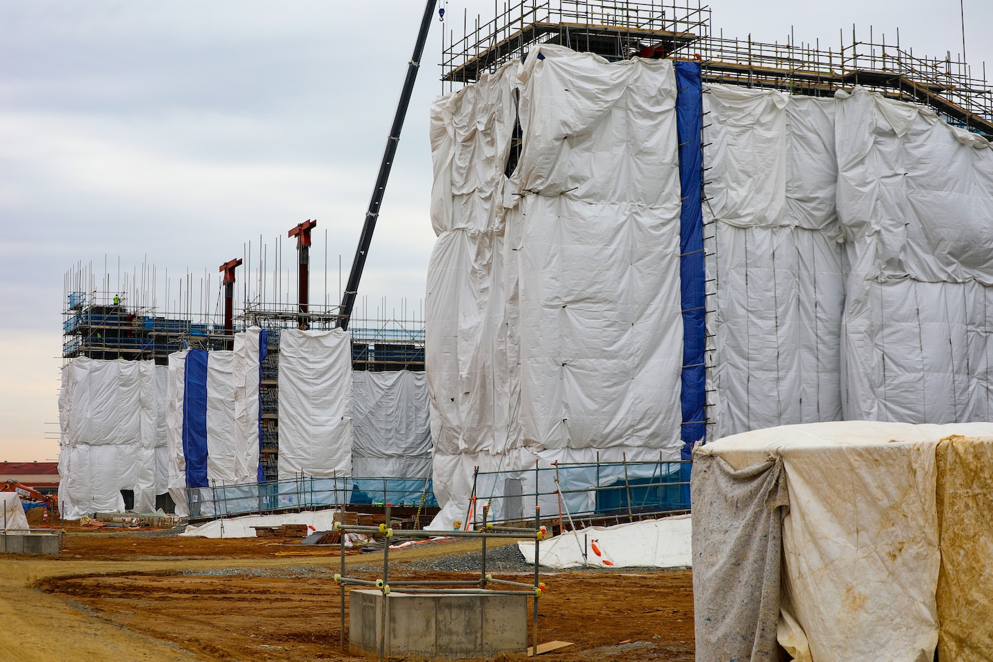 Contractor modifies project site for colder weather conditions.