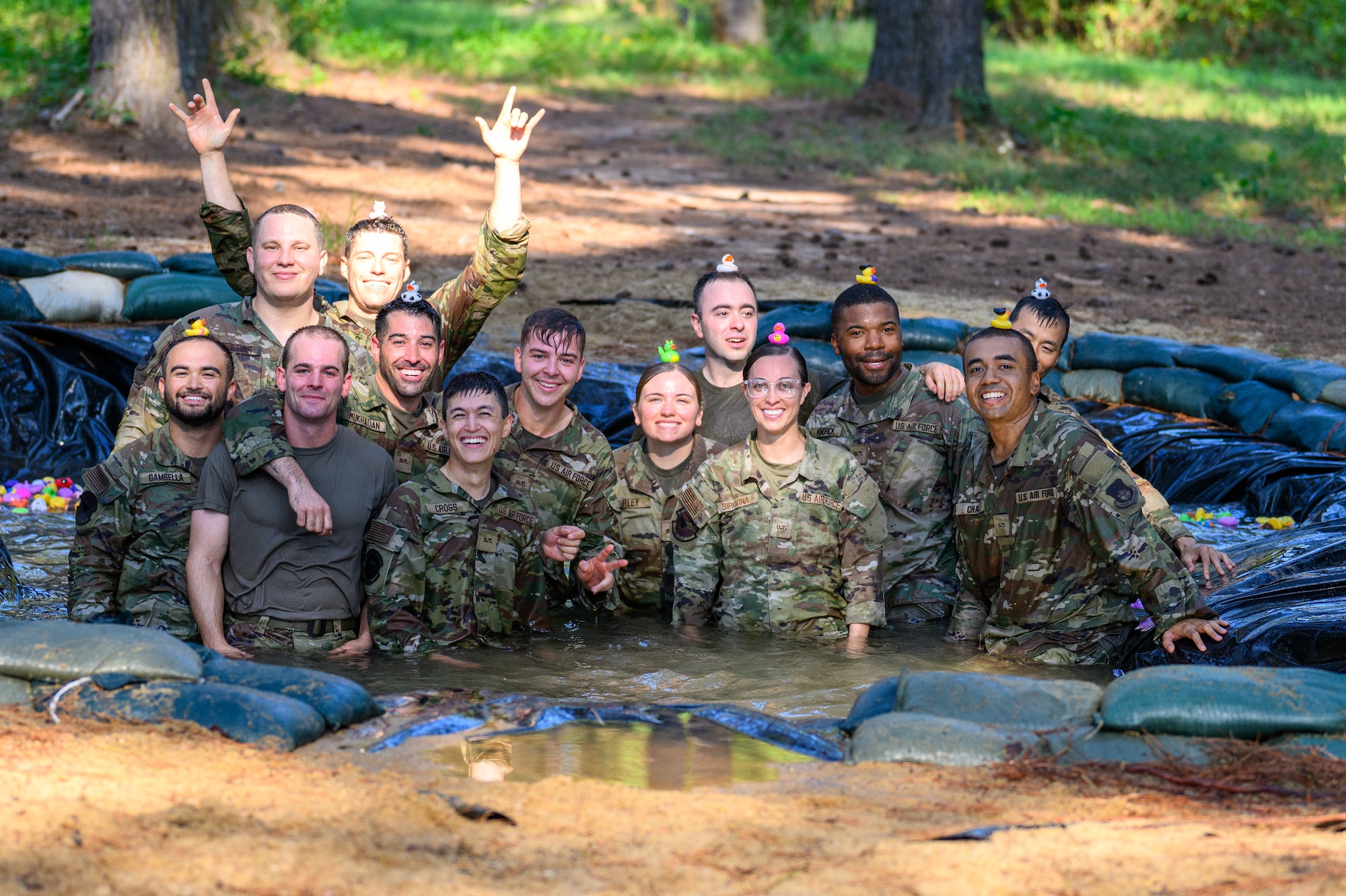 Then-Master Sgt. Chavis Kendrick (center) poses with fellow Airmen during a team-building training event earlier in his career. Kendrick previously served with the 60th Medical Group before commissioning.