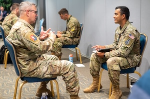 Col. Andy Dermanoski, Space Base Delta 3 commander, shares career insights with a captain during a Speed Mentoring session at Los Angeles Air Force Base on August 7, 2025. These rapid-fire mentoring rounds connect mentees with seasoned leaders for candid conversations on growth, opportunity and navigating the next steps. Whether the staff was seeking advice or offering it, this was their moment to engage and inspire. (U.S. Space Force photo by Mr. Van Ha)