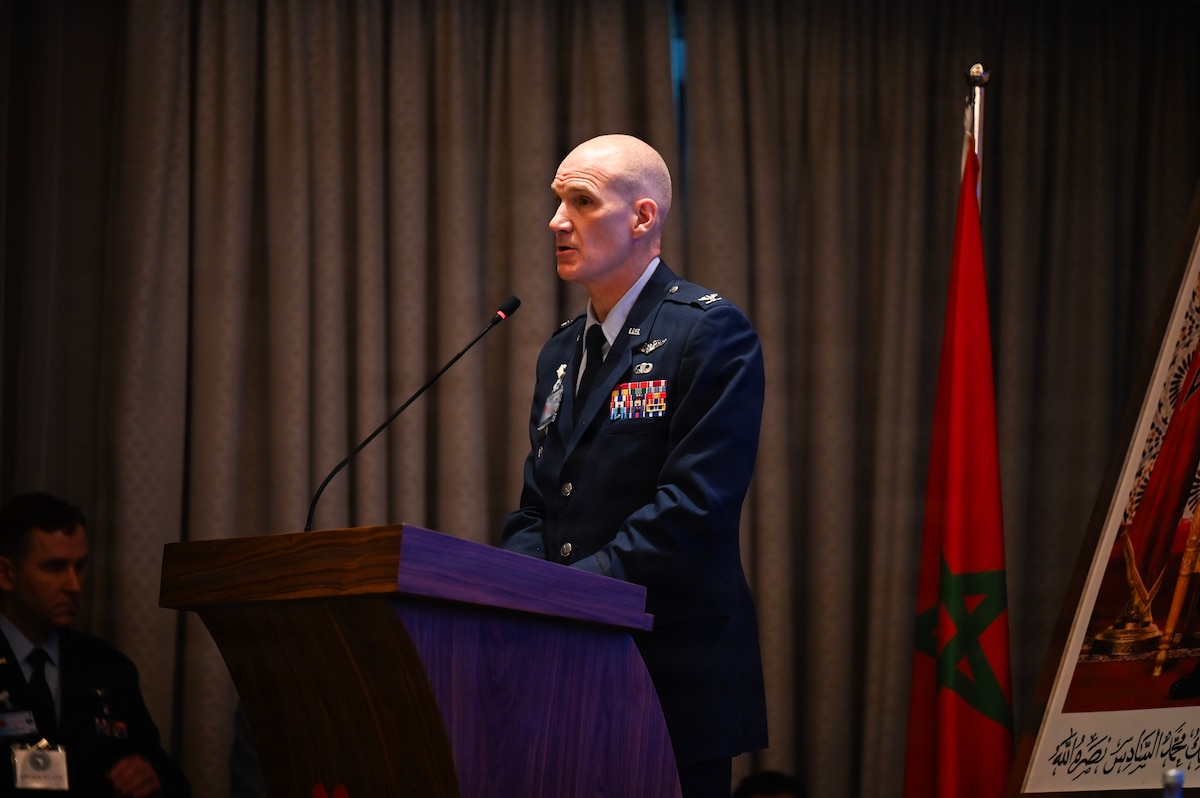 U.S. Air Force Col. Thomas Stamp, U.S. Air Forces in Europe - Air Forces Africa command surgeon, gives his opening remarks at the African Partner Outbreak Response Alliance 2025 Workshop in Rabat, Morocco, December 8, 2025. Representatives from 34 African nations came together with members from the U.S. Africa Command and USAFE-AFAFRICA command surgeon offices to engage in discussion on how to further enhance health security across the African continent. (U.S. Air Force photo by Capt. Benjamin Aronson) (This photo was altered for security purposes by blurring a security badge.)