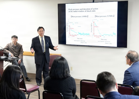 JOINT BASE SAN ANTONIO-FORT SAM HOUSTON – (Jan. 13, 2026) – Dr. Nobuaki Kiriu, an associate professor with Japan’s National Defense Medical College’s (NDMC) Center for Trauma, Burn and Tactical Medicine, briefs leadership and research scientists assigned to Naval Medical Research Unit (NAMRU) San Antonio of research on blast injury utilizing an air-driven shockwave generator at the Battlefield Health and Trauma Research Institute.  A series of briefings, led by Dr. Manabu Kinoshita, NDMC’s chairman professor, Department of Immunology and Microbiology, continues a sustained partnership between NAMRU San Antonio and NDMC to enhance each other’s capabilities to counteract emerging threats, benefiting military health as well as global health security. Navy Medicine Research & Development (NMR&D) contributes directly to positive working relationships with partner nation militaries, keeping the scope of Department of War capabilities wide, and at the ready, to address emerging threats aboard. NAMRU San Antonio, part of NMR&D, conducts gap-driven combat casualty care, craniofacial, and directed energy research in support of Navy, Marine Corps and joint U.S. warfighter health readiness and lethality while engaged in routine and expeditionary operations. (U.S. Navy photo by Burrell Parmer, NAMRU San Antonio Public Affairs/Released)